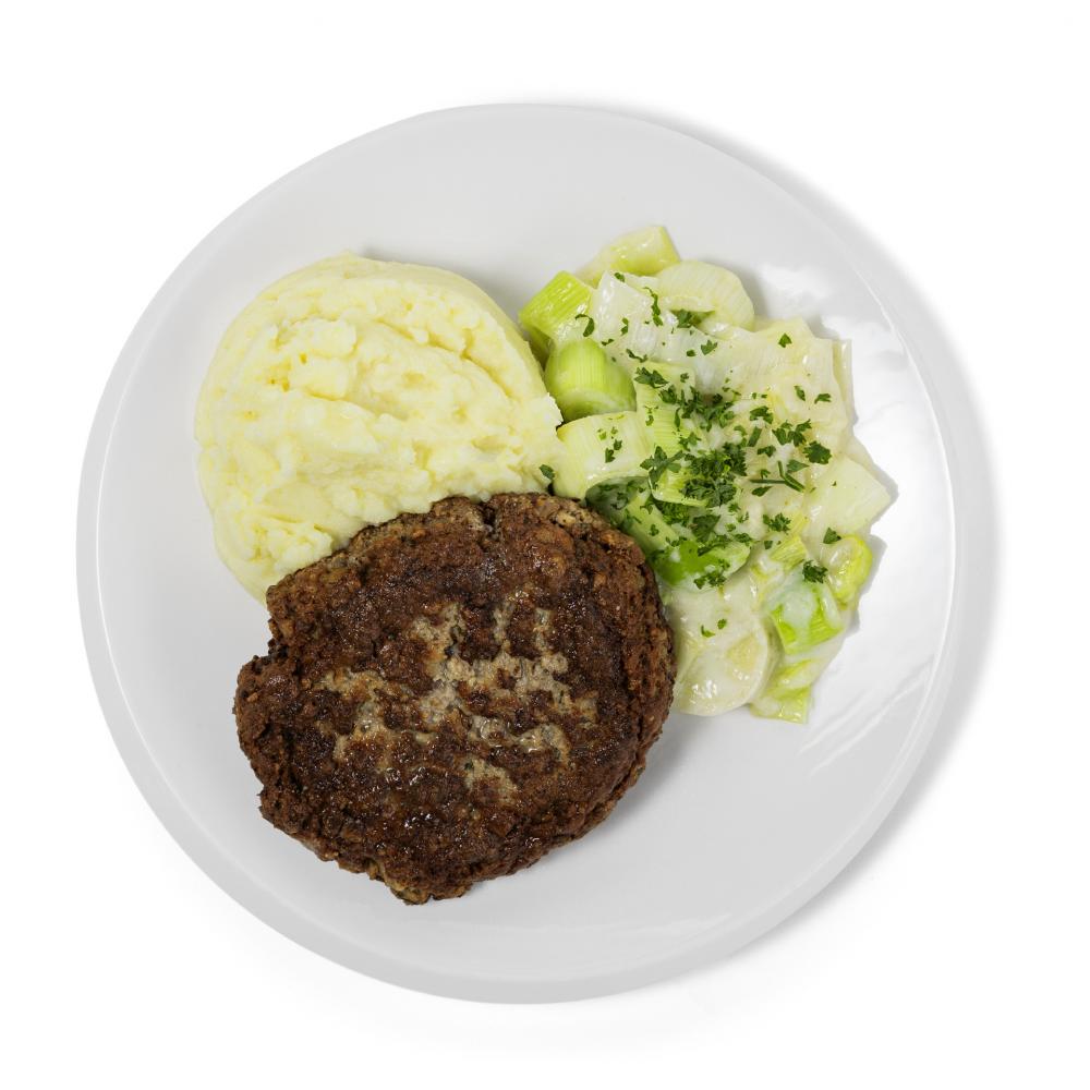 Produktabbildung GLOBUS Tagesgericht Samstag: Globus Küchenmeisterfrikadelle mit Lauchrahmgemüse, dazu Kartoffelstampf
